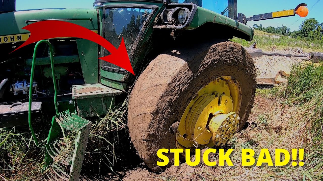 JOHN DEERE 4430 STUCK IN THE MUD!!
