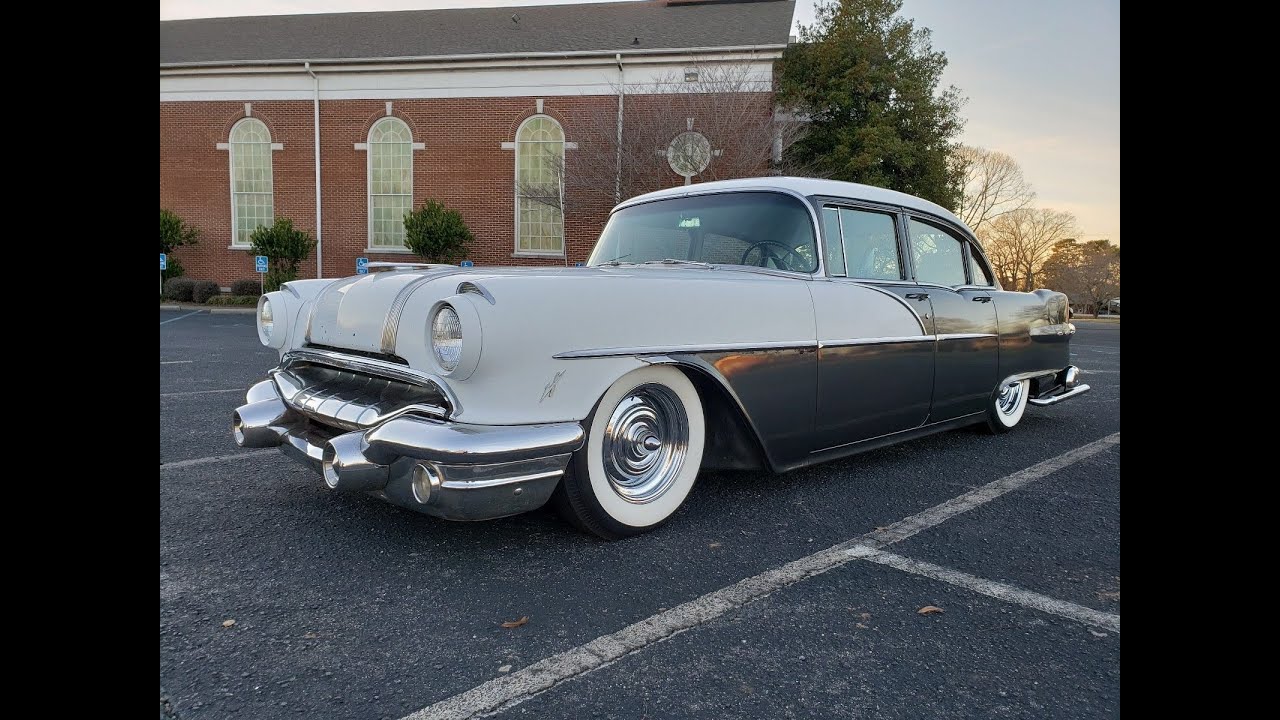 SOLD!** 1956 Pontiac Chieftain lowered, bell flower exhaust, wide whites. 513 CHOP SHOP