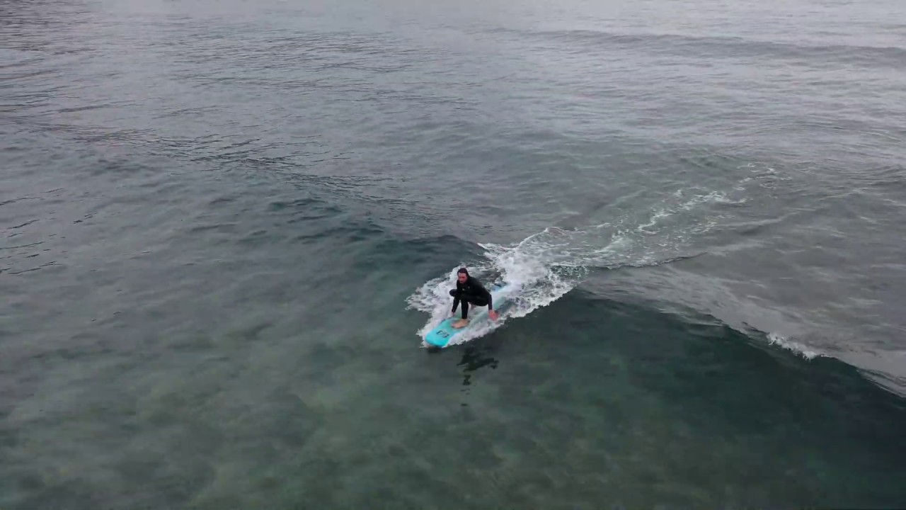 Surfing at Playa de Otur, Spain