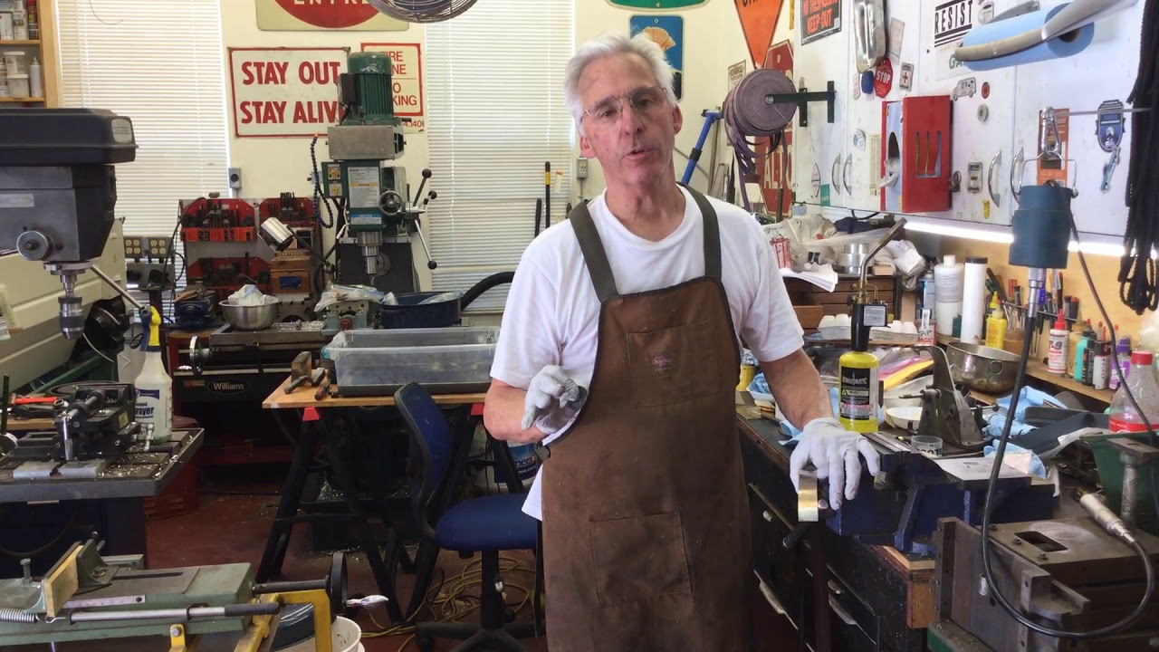 81.  Fixing the broken end of a phonograph main spring