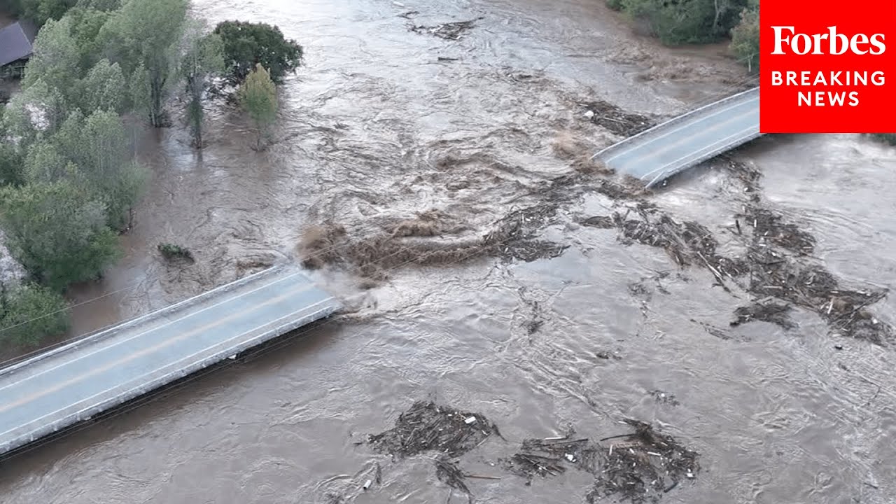Major Flooding From Hurricane Helene Causes A Bridge Collapse In Afton, Tennessee