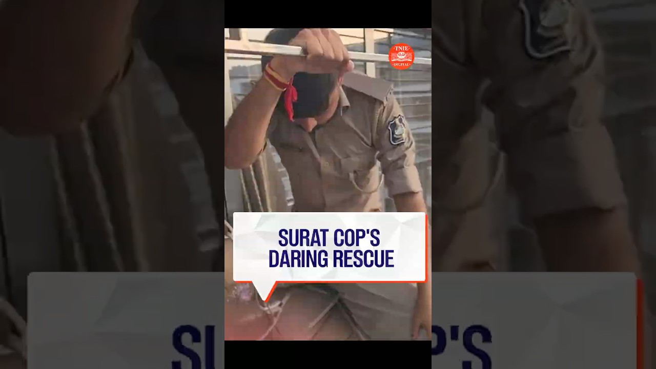 Surat cop risks own life to rescue man attempting suicide