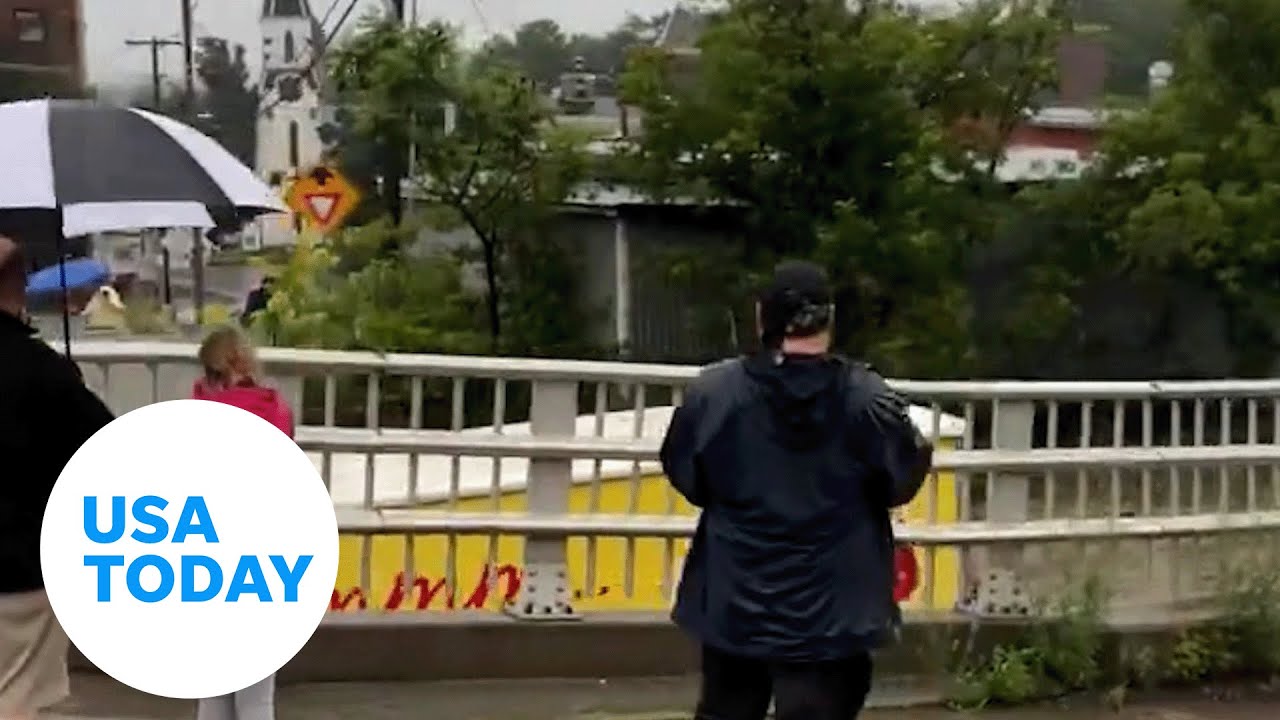 Frito-Lay delivery truck, carried by flood water, slams into bridge | USA TODAY