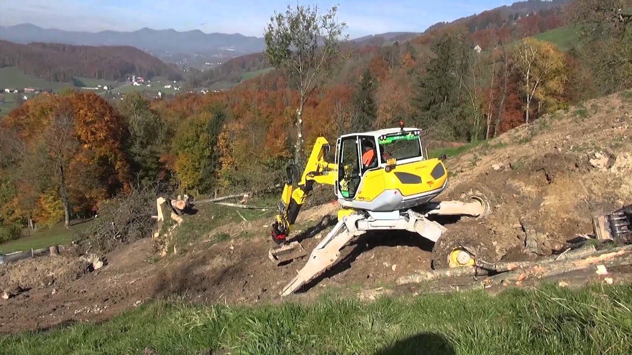 Menzi Muck M525 mit Oilquick