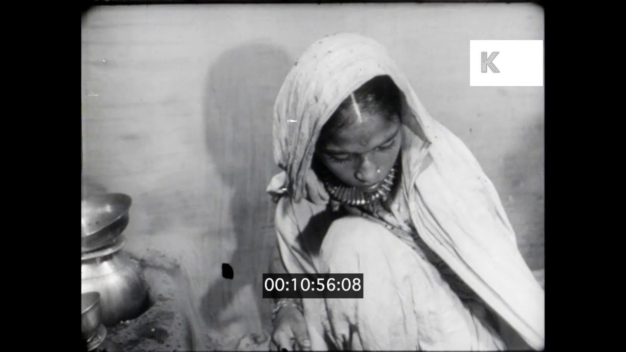1950s, 1960s India, Woman Cooking Chapati, 16mm
