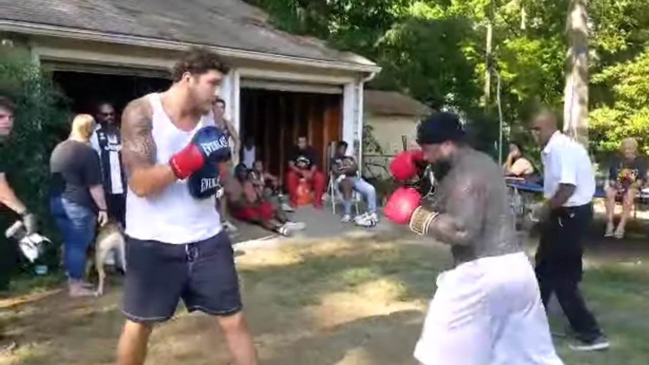 6ft 9 giant vs. Tatted prison guy