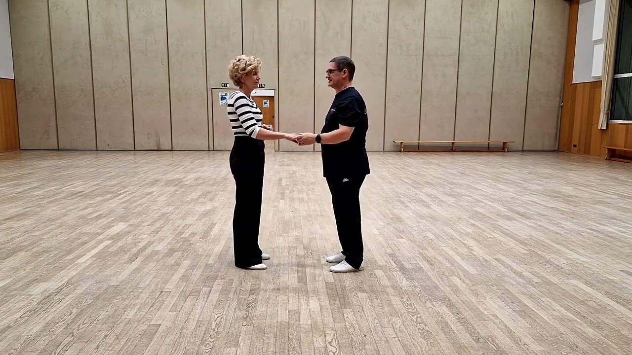 Platzwechsel Dame und Herr schauen sich an Boogie-Woogie Basic