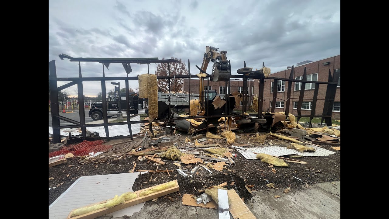 Demolishing Mobile Office Trailer with Caterpillar 308 Mini-Excavator