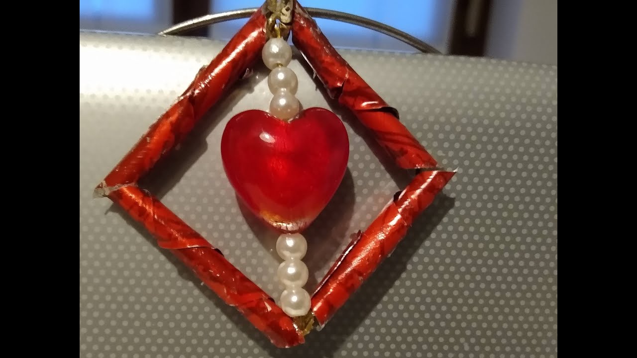 Ciondolo con cuore e cannucce di capsule Nespresso