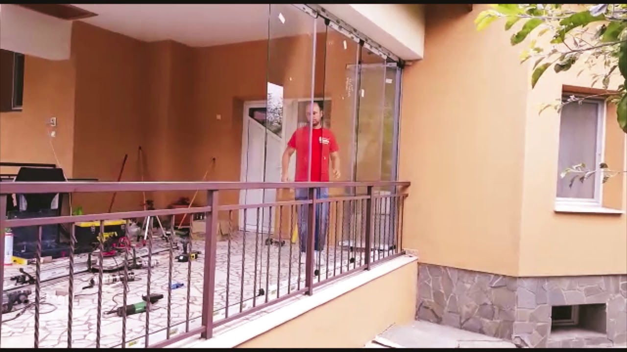 Sistem de inchidere armonic cu geamuri culisante pentru terase, balcoane