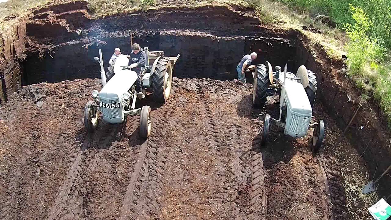 Mossmen turf cutting