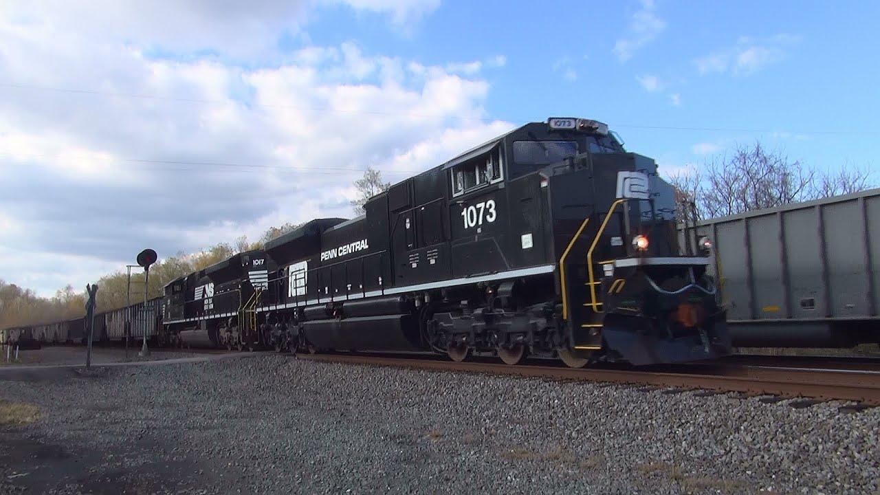 NS 1073 (Penn Central) leading NS 650 EB at MP: PT 148