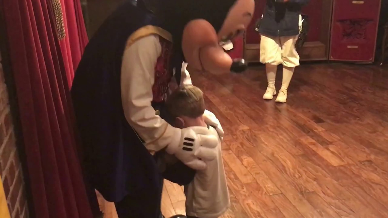 Meeting his favorite. E-Y!!!! (Mickey Mouse)