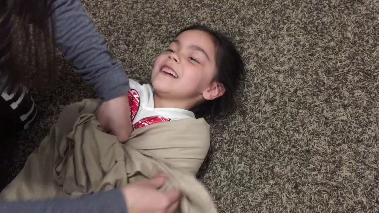 The Hotdog Swaddle Escape Challenge