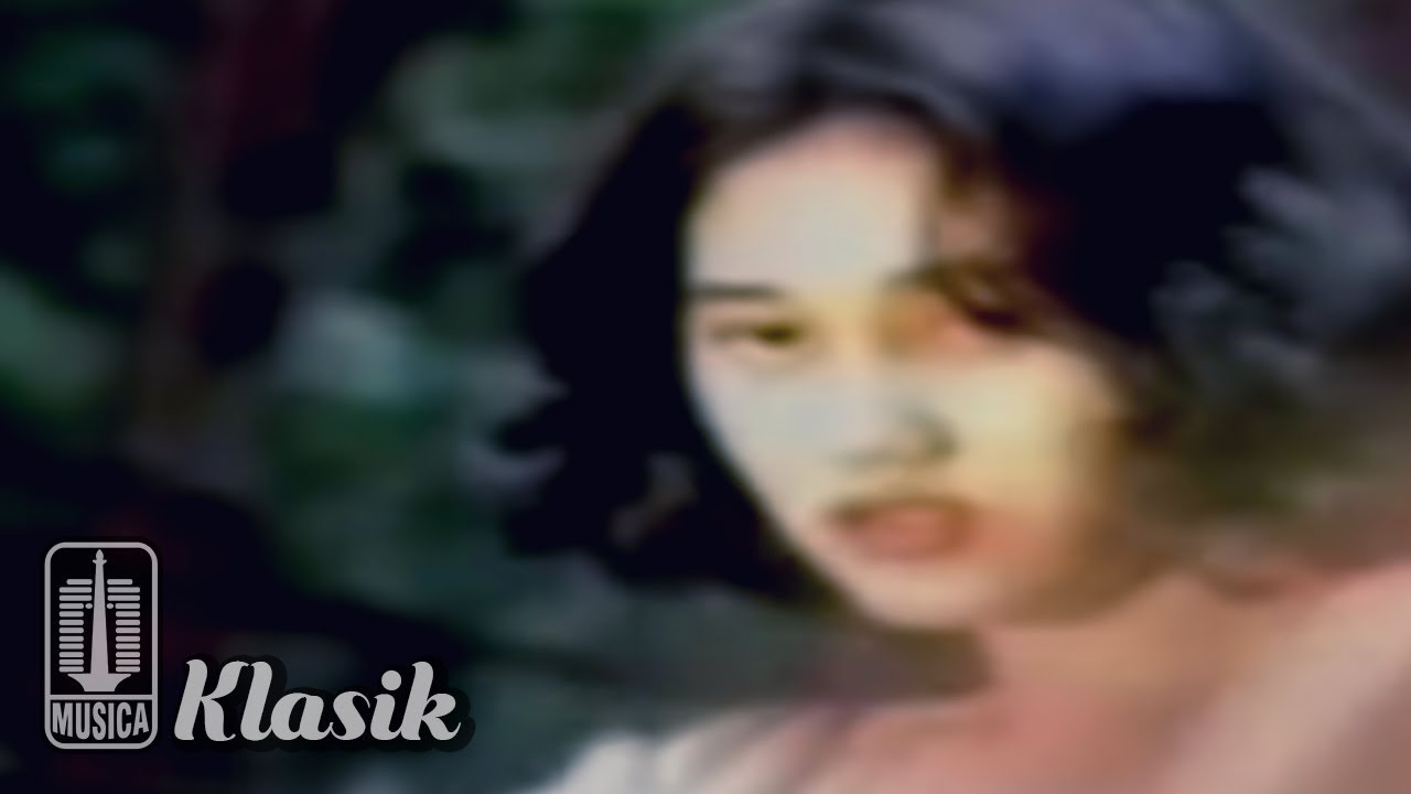 Nike Ardilla - Biarkan Cintamu Berlalu (Official Karaoke Video)