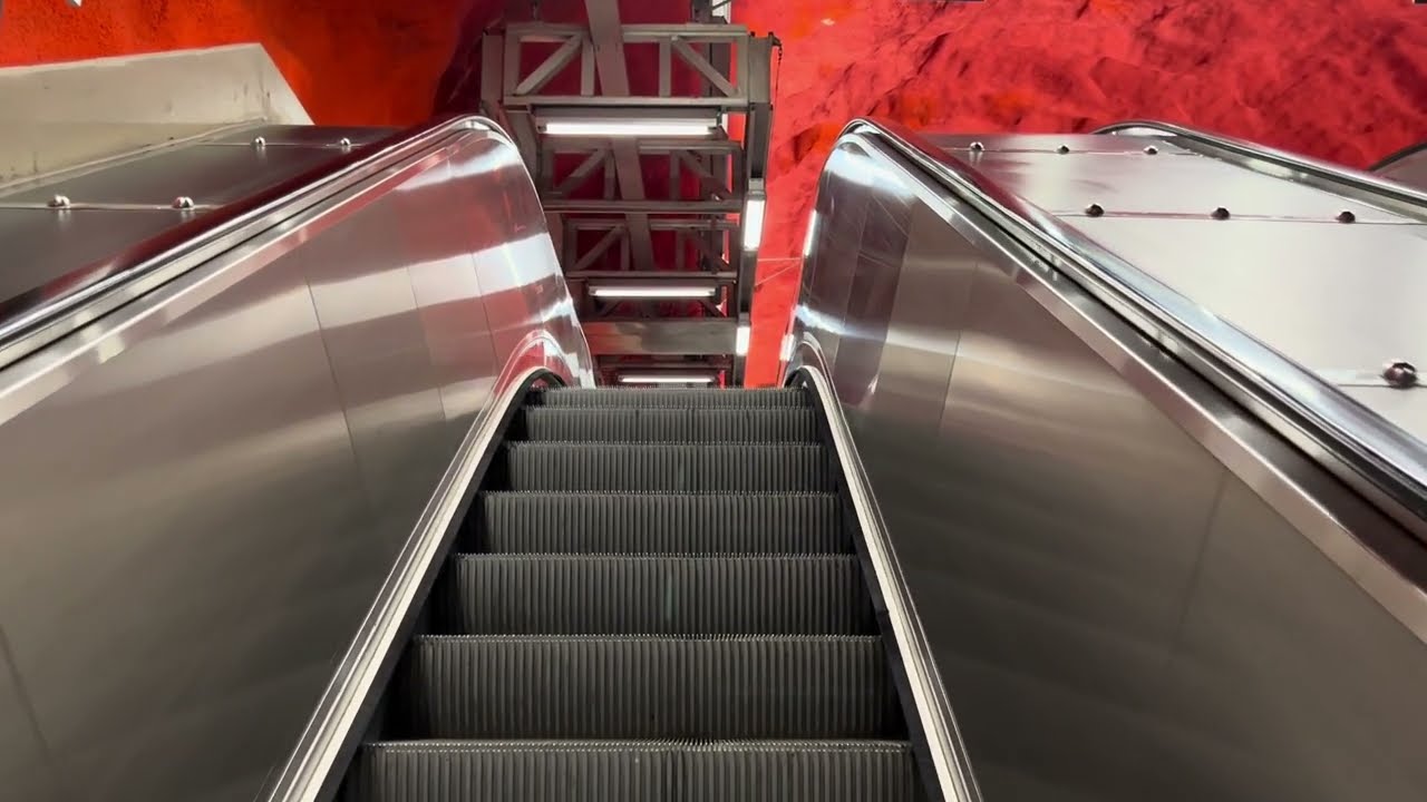 Stockholm - Solna Centrum. 4x KONE escalator ride with a walk around station and platforms