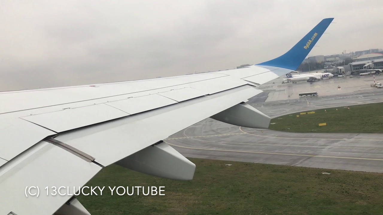 Takeoff from Warsaw. Embraer ERJ-195AR. PS802