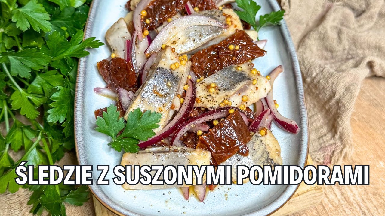 Przepis na śledzie z suszonymi pomidorami – szybka i smaczna przekąska! | jedz pysznie