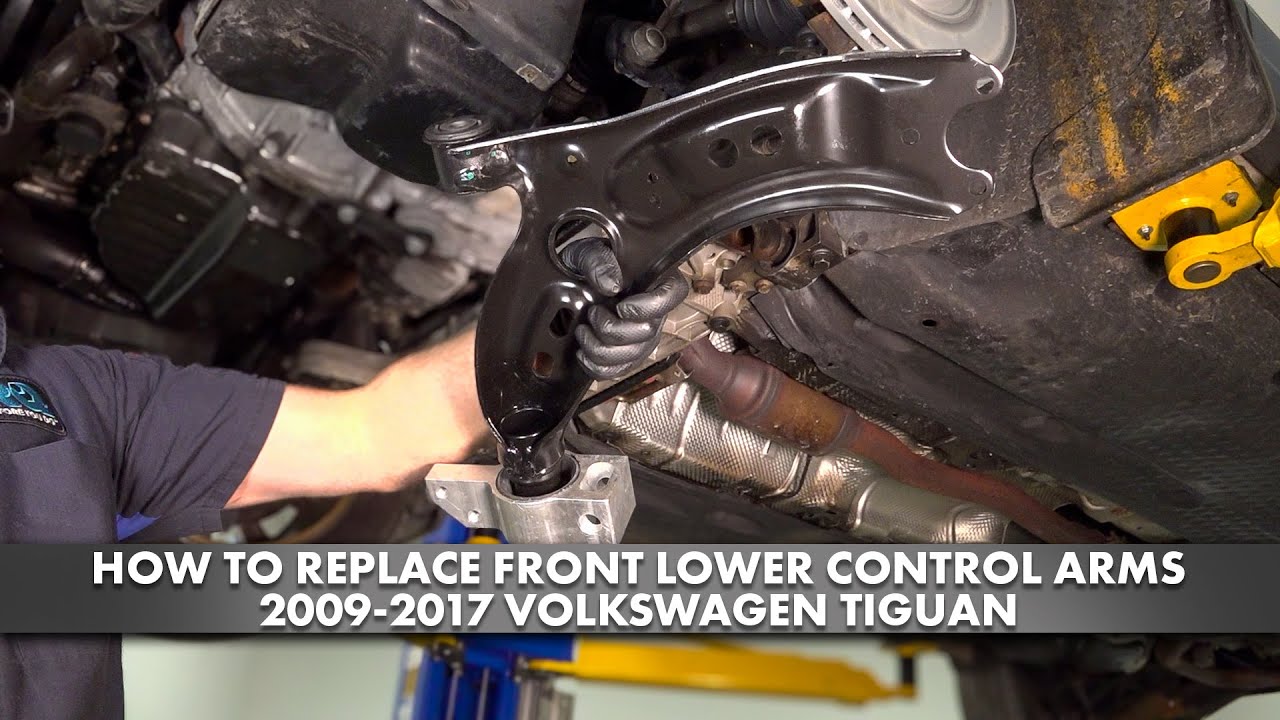 Как заменить передние нижние рычаги подвески Volkswagen Tiguan 2009-2017