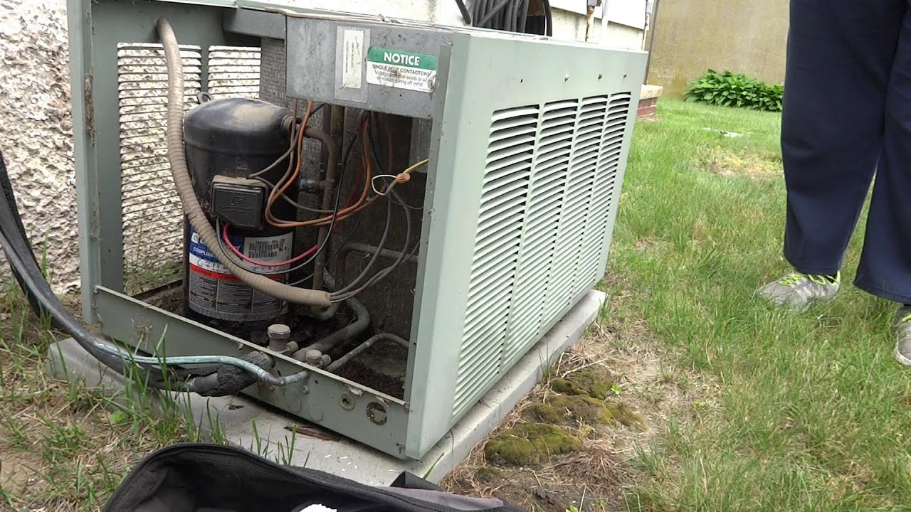 AIR CONDITIONING COMPRESSOR SHORTED TO GROUND