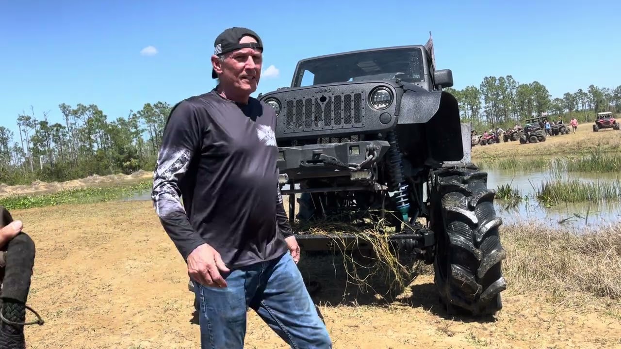 RYC  jeep stuck in swamp LMTV to pull him out 