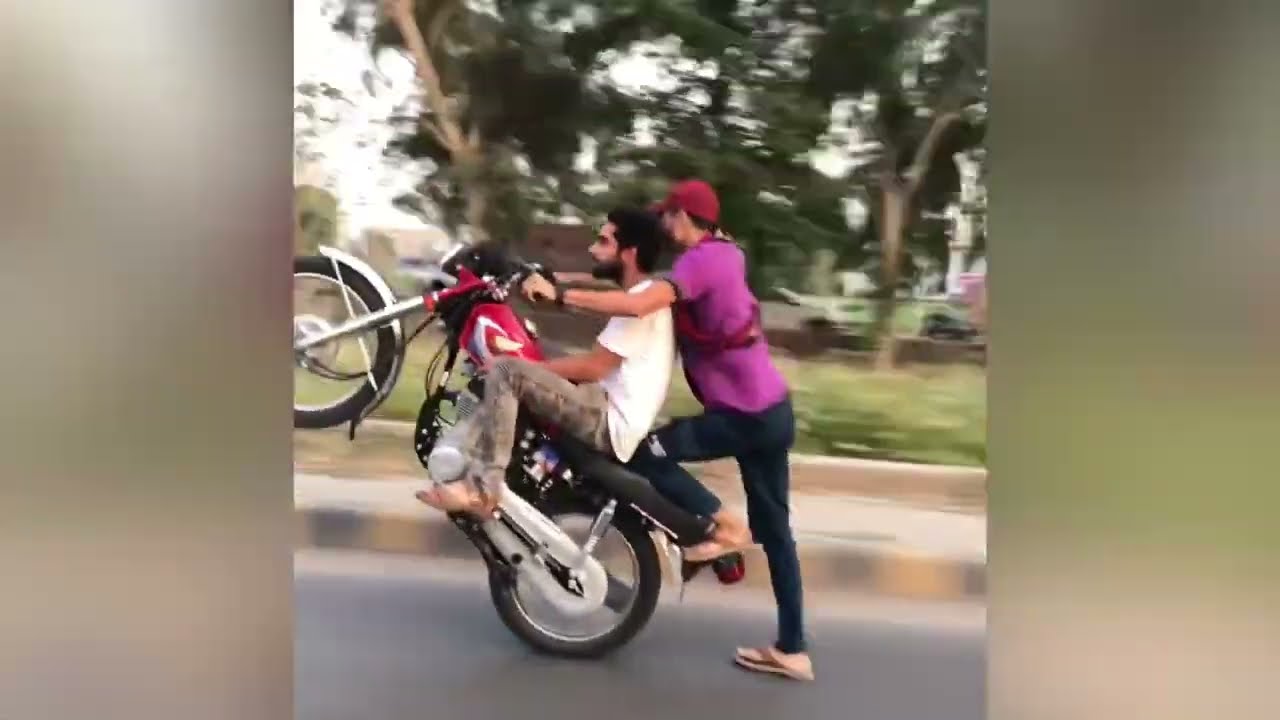 Shahnawaz 46 one wheeling | faisalabad round#viralvideo #growyourchannel #bikeridingskills