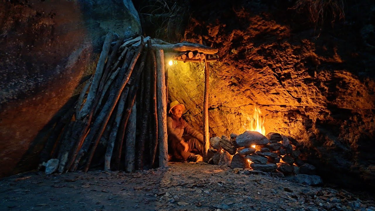 Bushcraft Camping by the River – Survival Shelter Between Massive Boulders