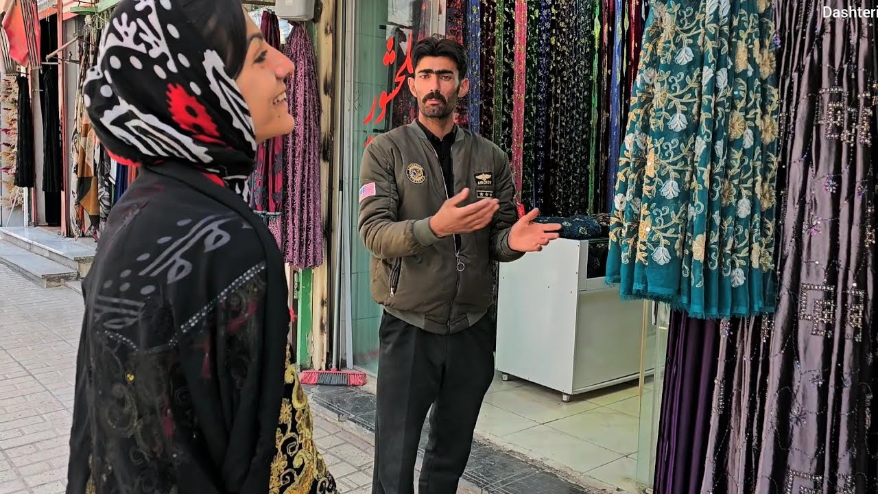 Leila and Shahin go to the market and Shahin is buying clothes for both Leila and Khushali.
