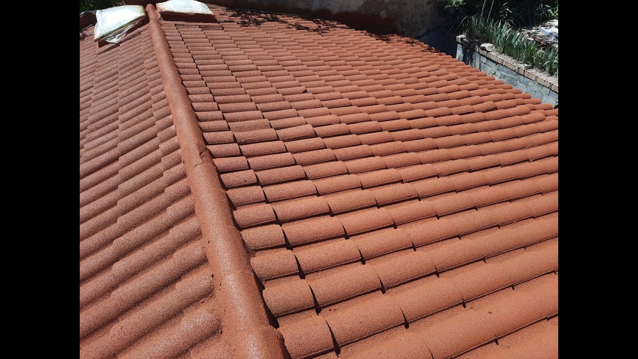 Limpieza y proyectado de cubierta con corcho proyectado DECO16