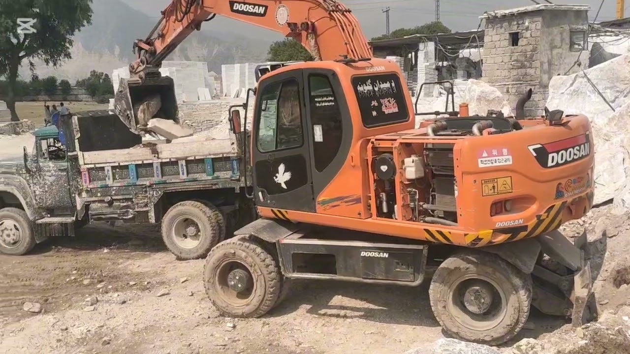 How axcavator work in marble factory 