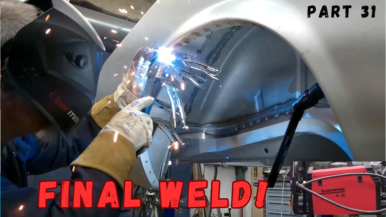 Final weld of dynacorn quarter panels on a 1969 Mach 1 Mustang. Slither part 31
