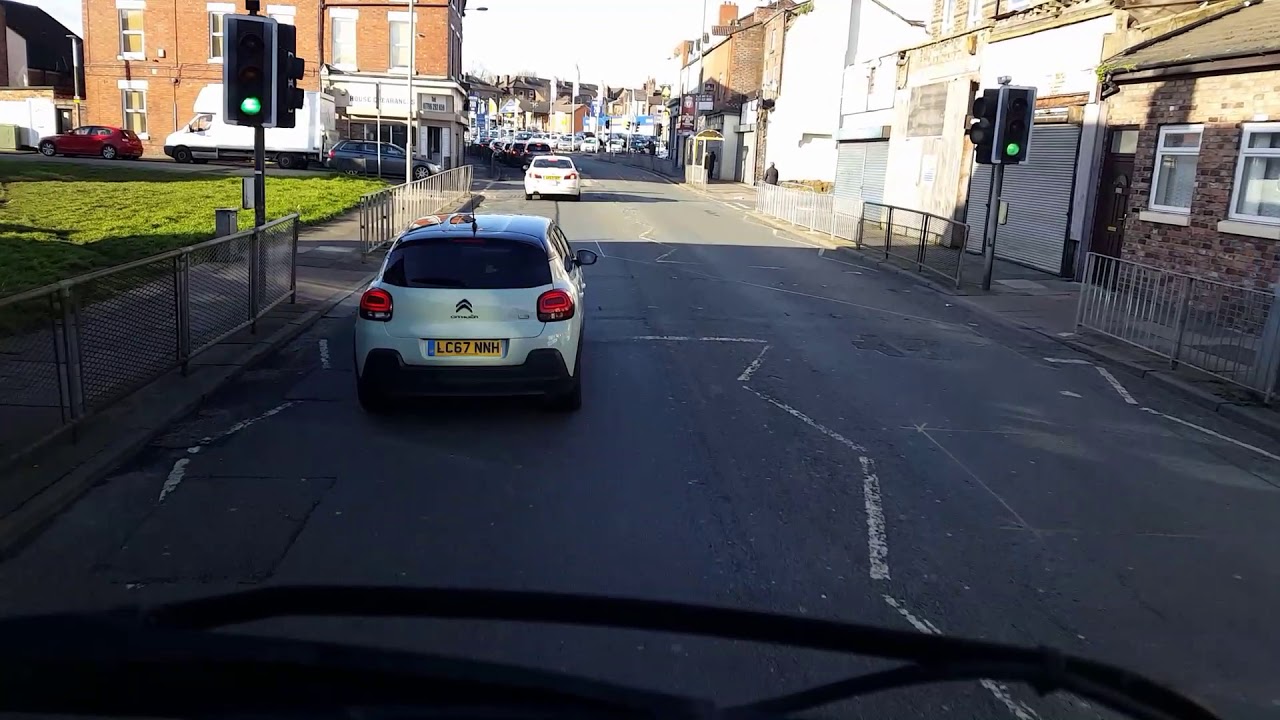 This idiot thinks it's ok to drive past a queue of traffic to get to the front