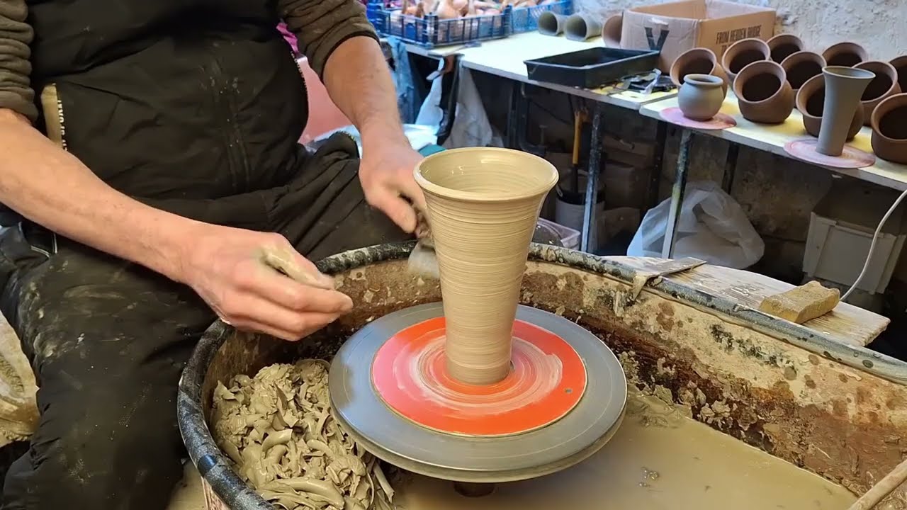 Making Pottery Wall Hanging Vases.