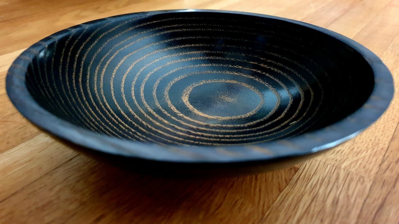 Woodturned bowl stained and finished with gilt cream