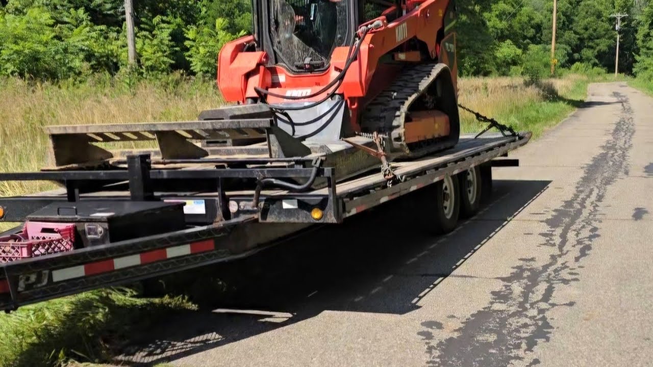 kioti TL750 brush hogging with a wolverine 72 inch brush cutter