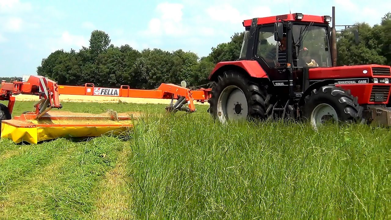 Case International 1056XL met 4m brede getrokken Fella maaier