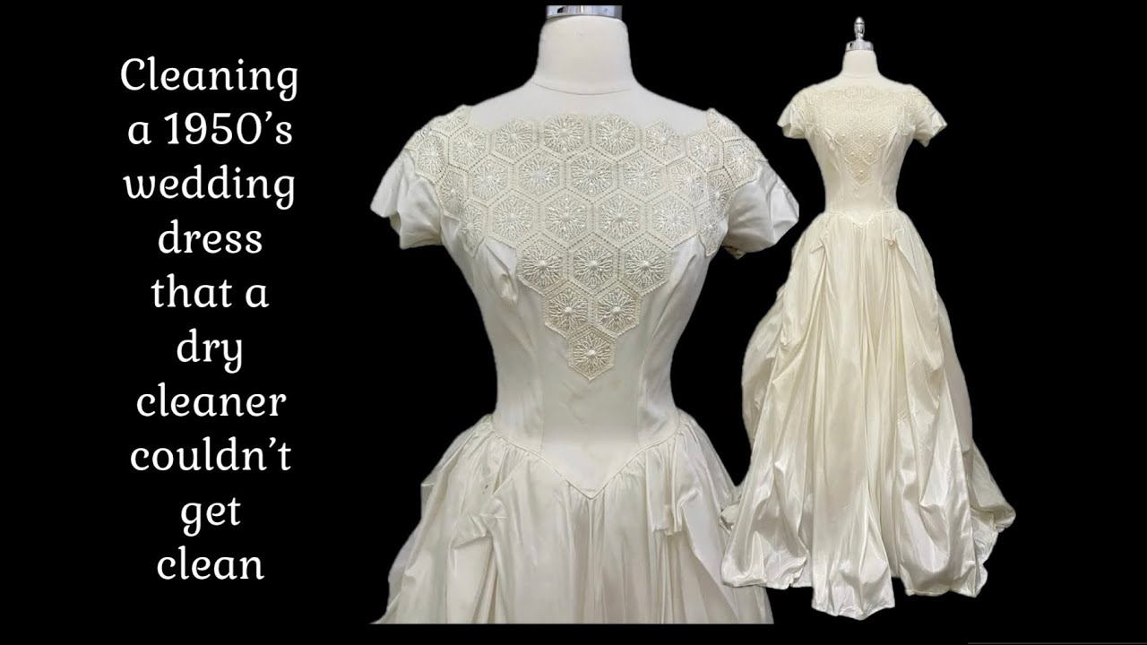 Attempted cleaning by a dry cleaner without success, a 1950’s wedding dress is restored in a bathtub