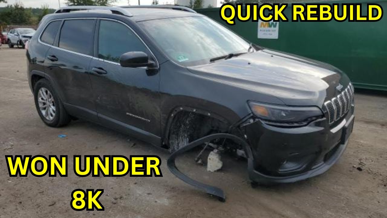 REBUILDING A WRECKED JEEP CHEROKEE IN 20 MINS OR LESS