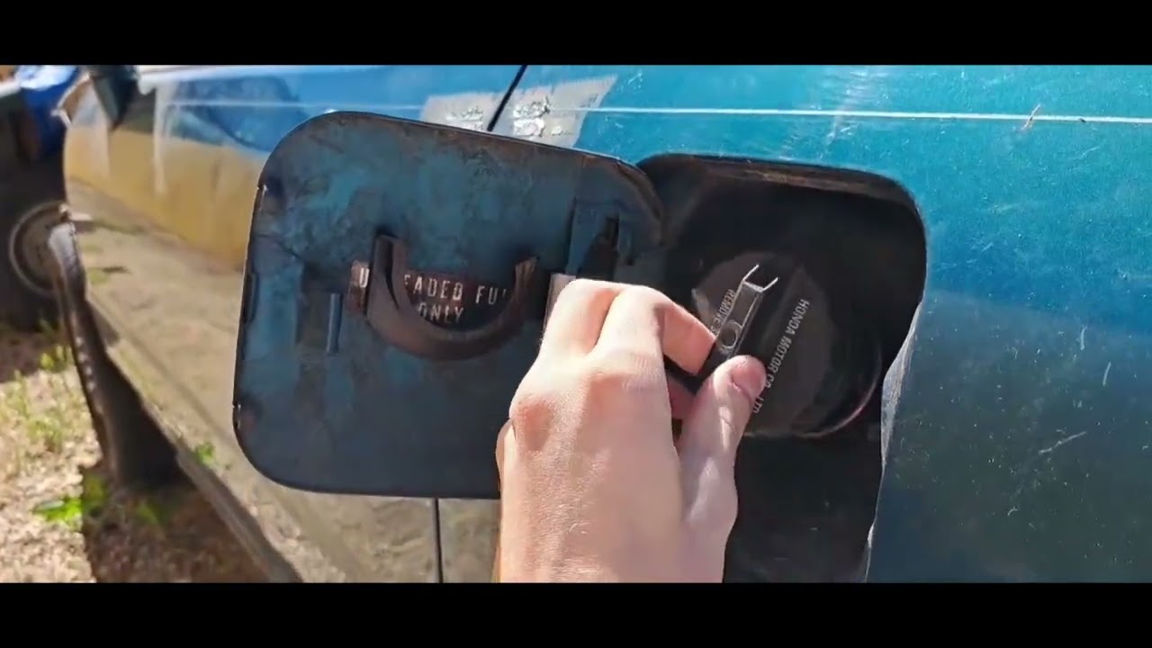 how to install del sol gas cap holder