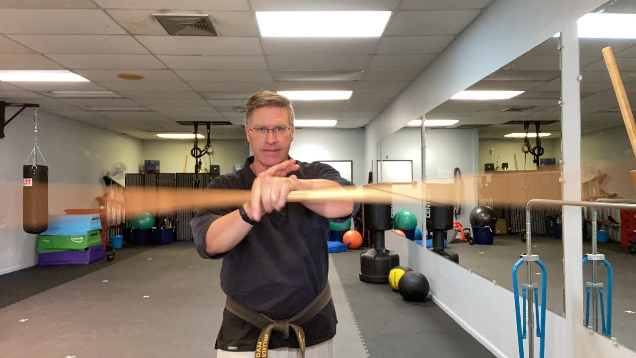 Bo staff training at home. Spinning a martial arts staff
