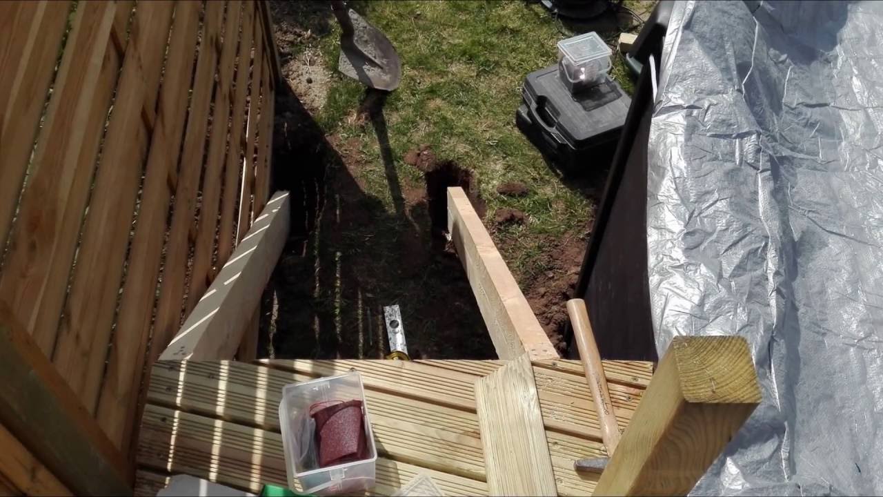 réalisation terrasse bois sur pilotis autour d'une piscine hors sol
