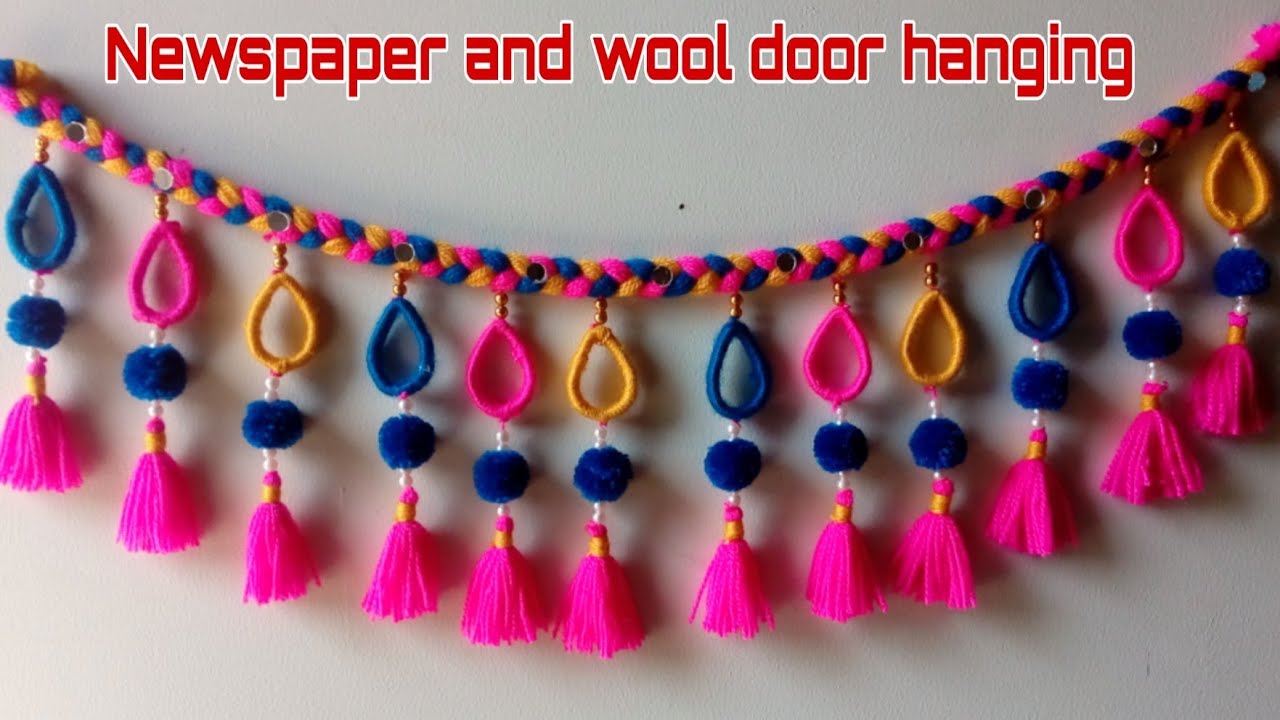 DIY easy woolen and newspaper door hanging/ wool toran making/ Amazing toran/ DIY Innovativ Ideas