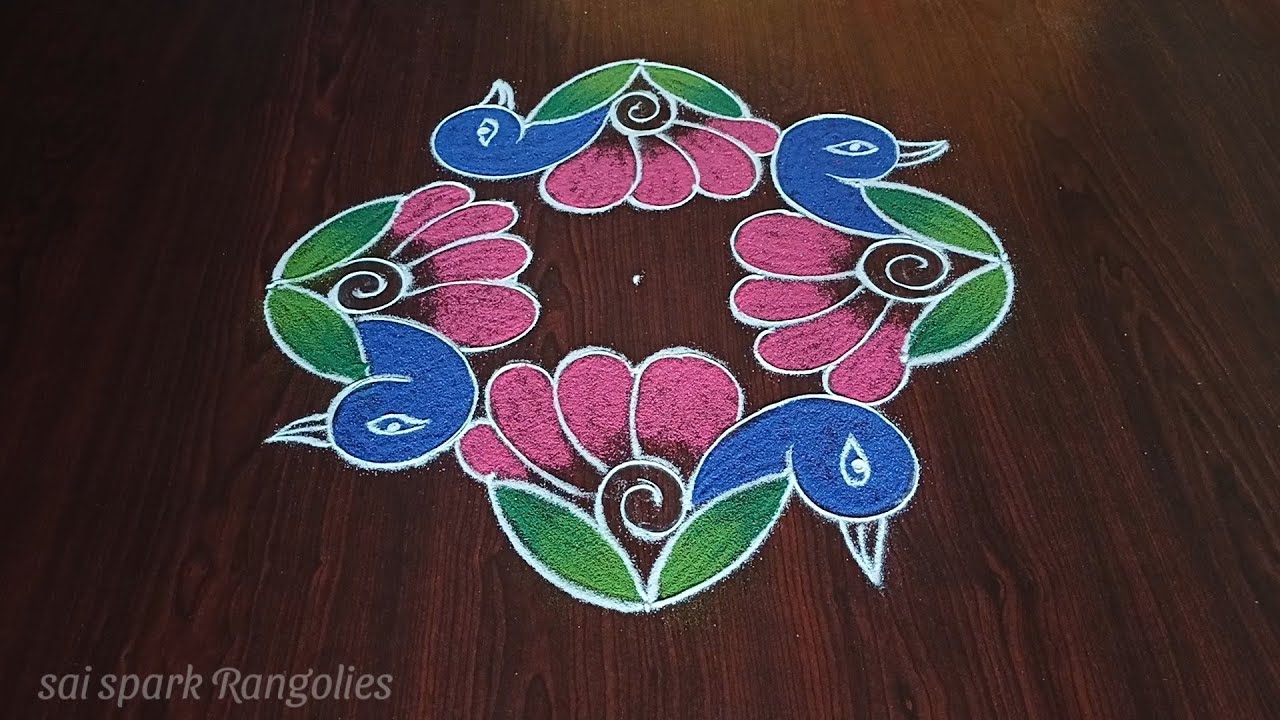 creative peacock rangoli | new rangoli designs | latest mayil kolam @saisparkrangolies