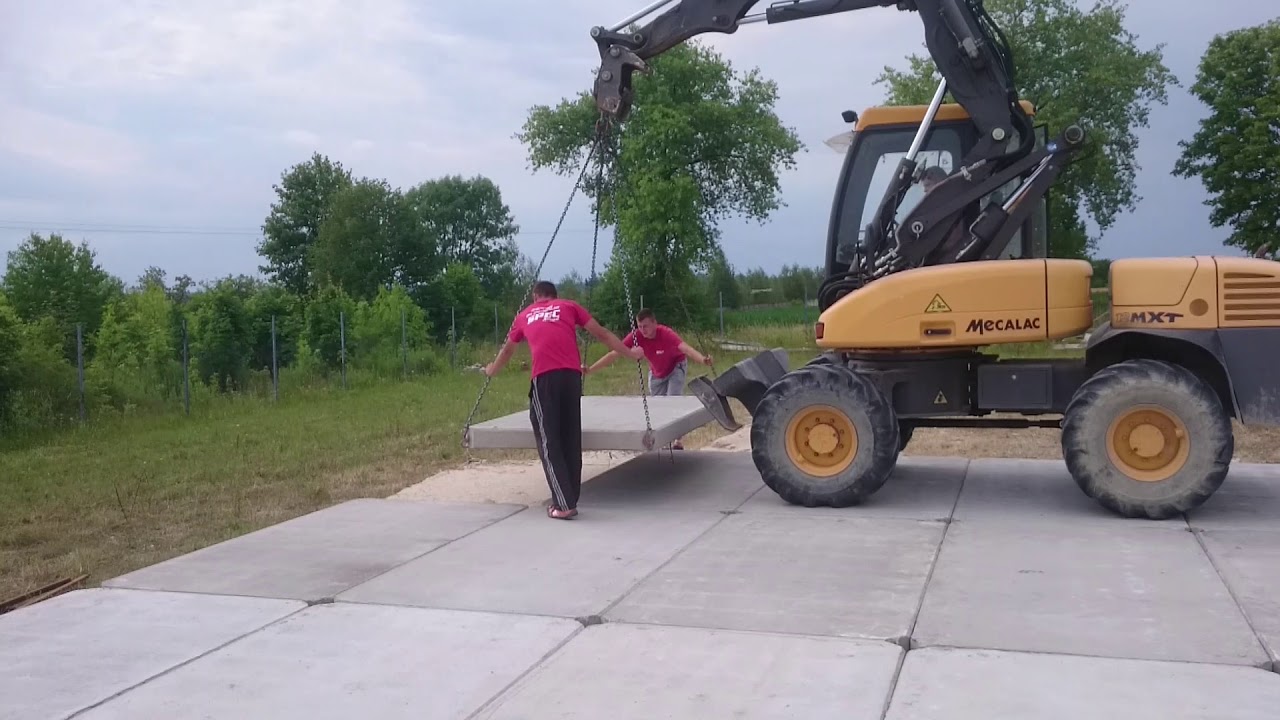 Mecalac 12 MXT płyty drogowe