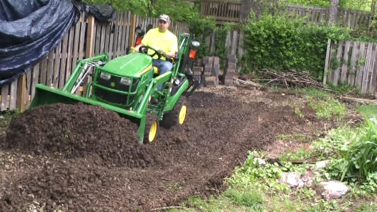 #63 Deere 1025R & Toothbar vs. Crushed Rock Driveway