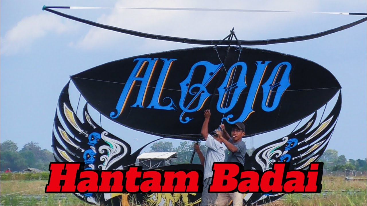 Layangan Algojo Versus Hantaman Angin Barat Daya
