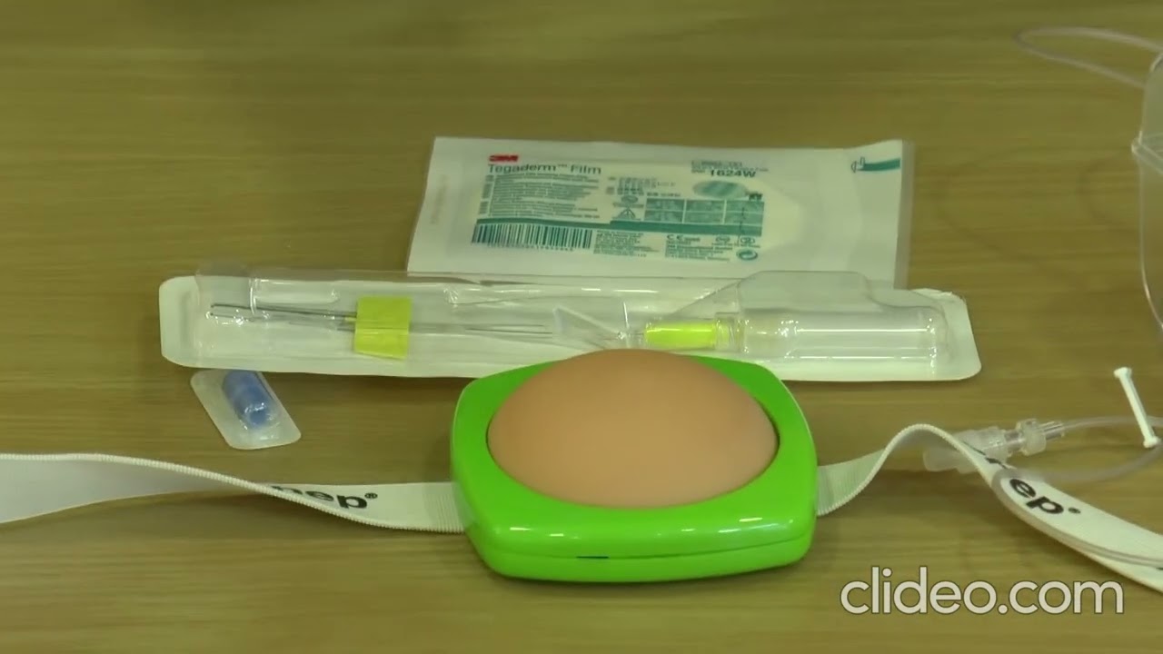 demonstration on the insertion of a saf t intima for continous subcutaneous infu LcXrMnPg