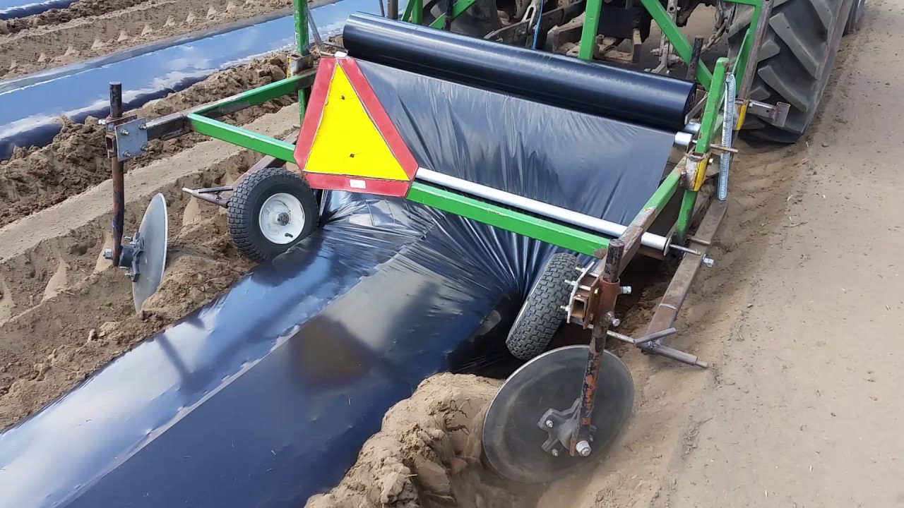 Bed former and plastic mulch Layer