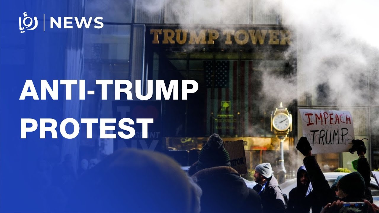 New Yorkers rally outside Trump Tower on second inauguration anniversary