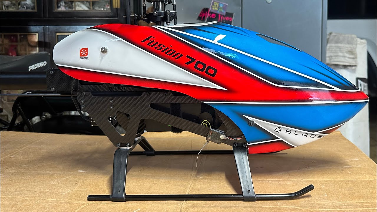Horizon Hobby Blade Fusion 700. Beat down till dead battery.  She’s tuned now. #horizonhobby